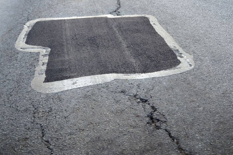 Crack Filling and Pothole Repair
